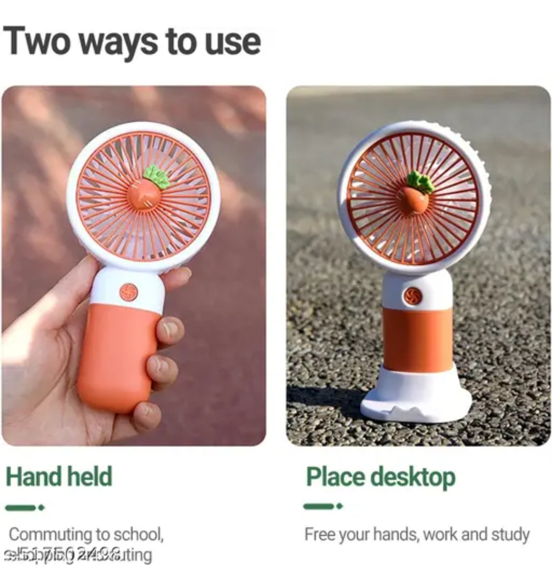 Mini portable USB Hand fan with built in rechargeable battery operated. Summer cooling gadget